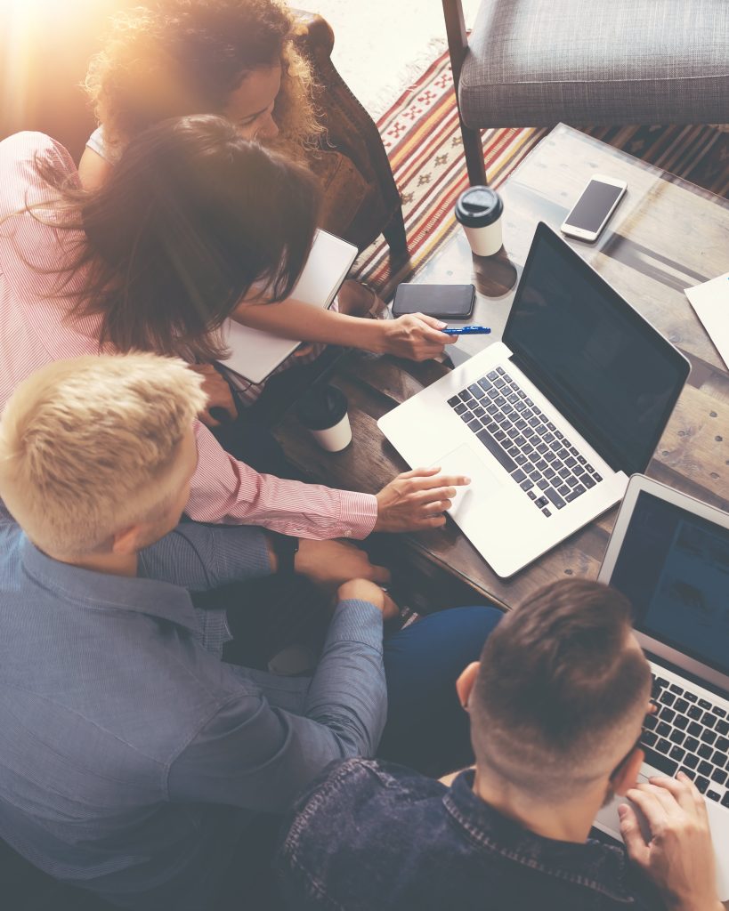 people in a meeting over computer